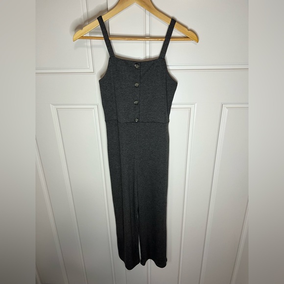 Gray, cropped/ankle jumpsuit with straight leg. Thin straps and button down top. - Picture 9 of 10